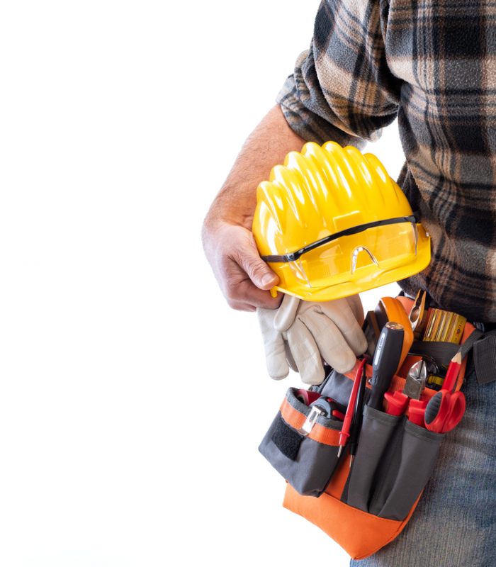 Carpenter,Electrician,Holds,Helmet,And,Protective,Goggles,In,Hand.,Construction